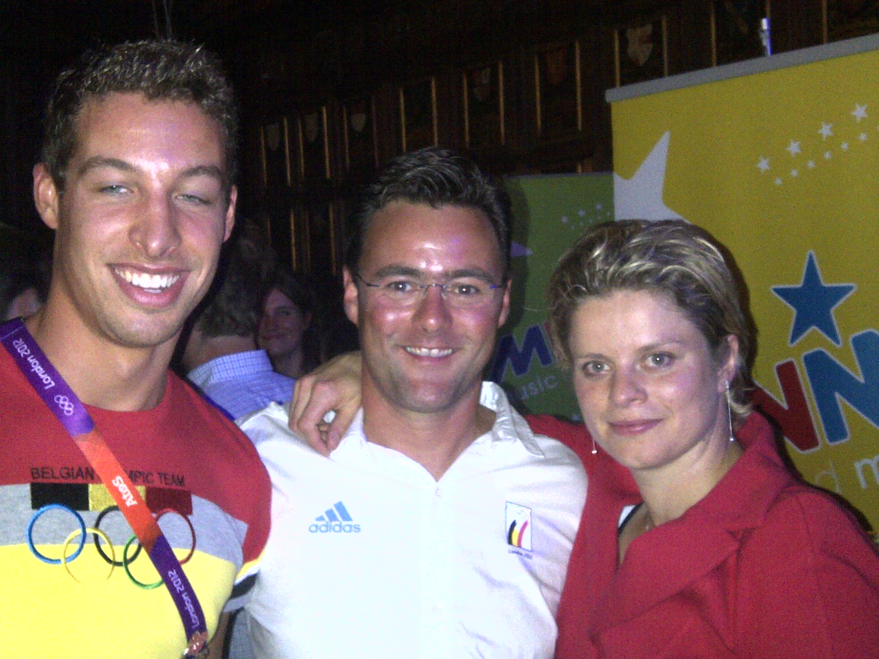 Carl Maes with Kim Clijsters and a Belgian Olympic Team athlete at the London 2012 Olympics
